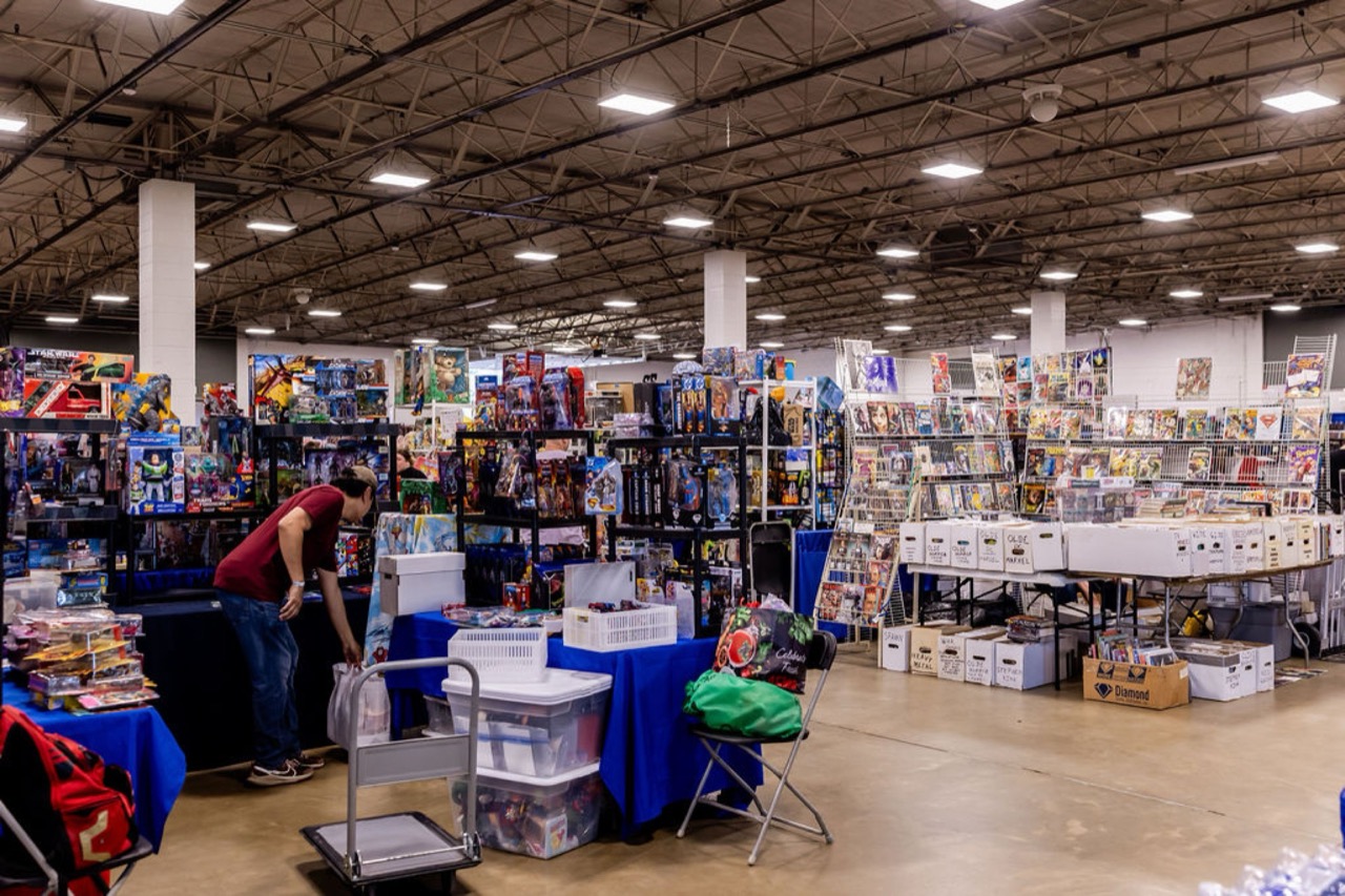 Rows of vendor booths packed with toys, comics, and collectibles across the Maryland Toy Expo show floor